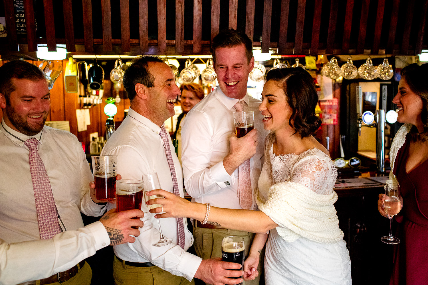 Bride and groom in the pub on wedding day